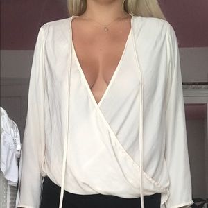 Long sleeve cream blouse
